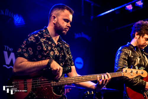 Ash Milburn on bass