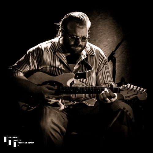Kid Andersen on guitar