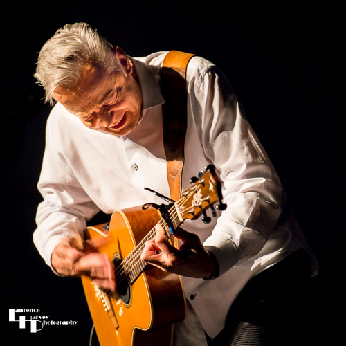 Tommy Emmanuel on guitar