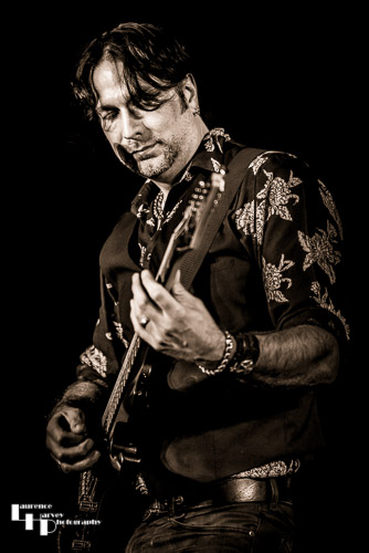 Aaron Bond on guitar & vocals