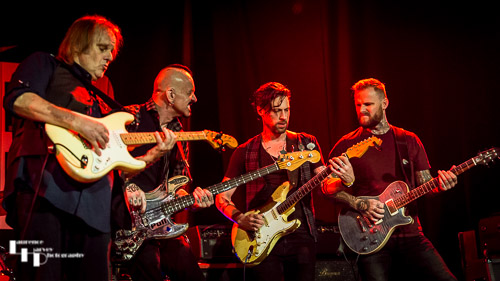 Walter Trout & his band on stage with guests Dan Patlansky & Kris Barras