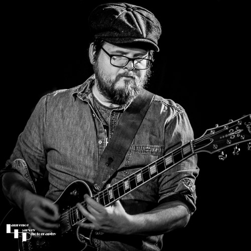 Mark ‘Boweevil’ Howes on guitar