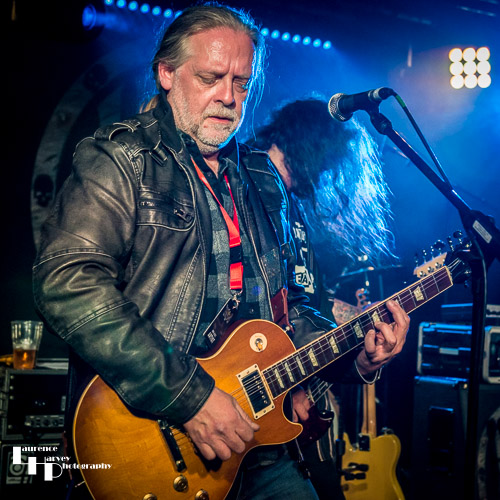 Tom Lord on guitar