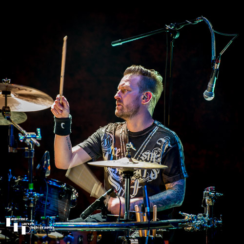 Adam Booth on drums