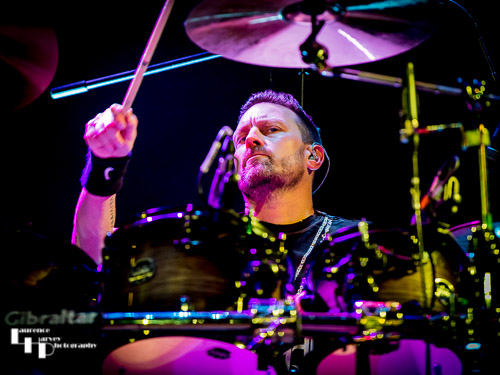 Adam Booth on drums