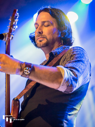 Aaron Bond on guitar & vocals