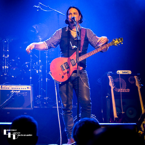 Aaron Bond on guitar & vocals