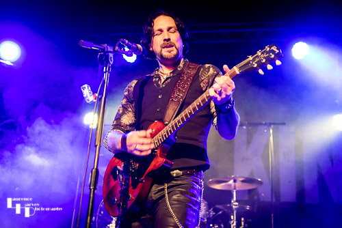 Aaron Bond on guitar & vocals