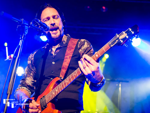 Aaron Bond on guitar & vocals