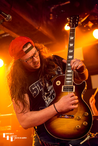 Charlie McCarthy on vocals & rhythm guitar