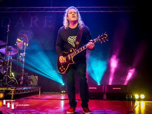 Vinny Burns on guitar