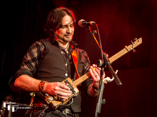 Aaron Bond on cigar box guitar & vocals