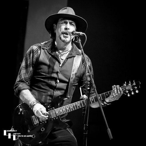 Aaron Bond on guitar & vocals