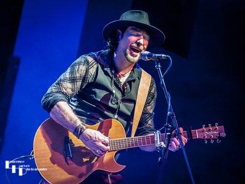 Aaron Bond on guitar & vocals