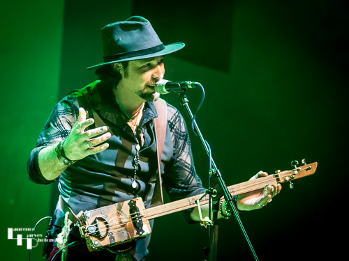 Aaron Bond on cigar box guitar & vocals