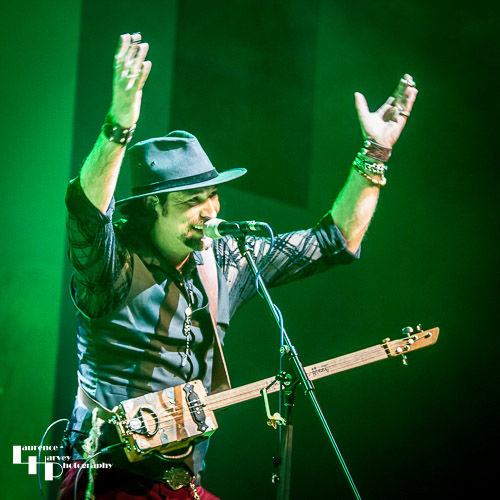 Aaron Bond on cigar box guitar & vocals