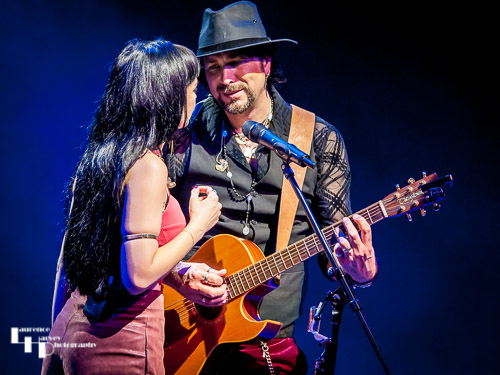 Grace Bond on vocals, Aaron Bond on guitar & vocals