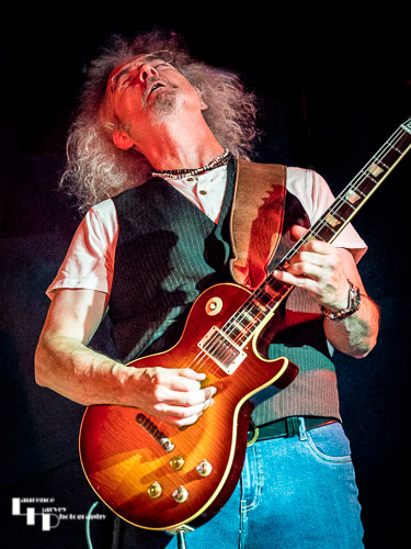 Toby Jones on guitar