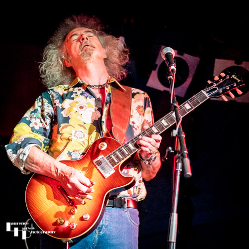 Toby Jones on guitar