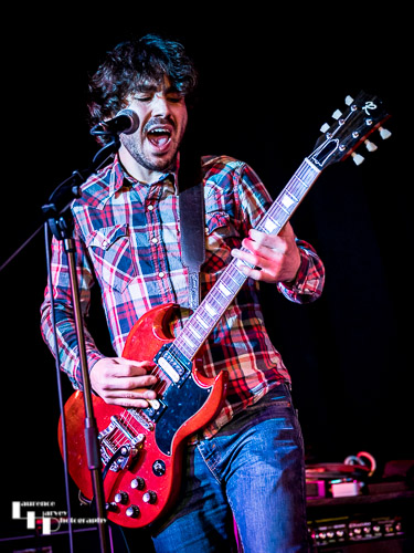 Lewis Grey on guitar & vocals