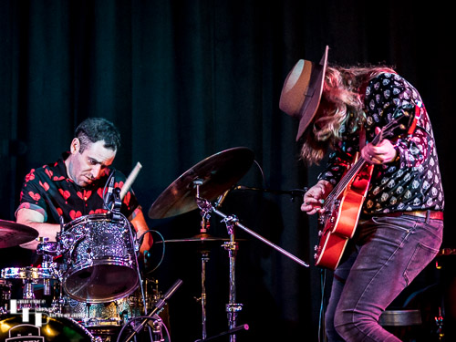 Joshua Carr on bass, Adam Merchant on drums