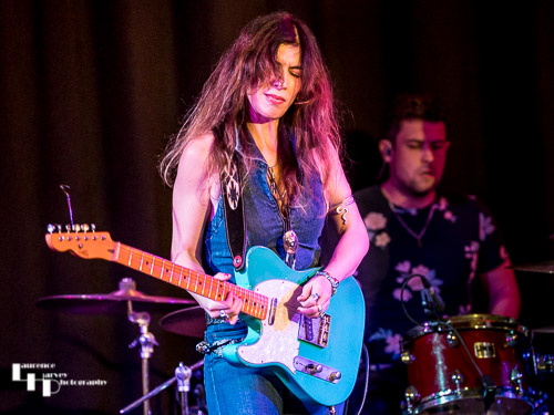 Susan Santos on guitar & vocals