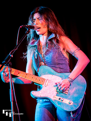 Susan Santos on guitar & vocals
