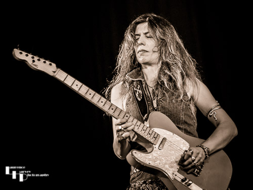 Susan Santos on guitar & vocals