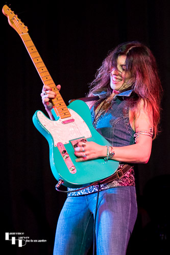 Susan Santos on guitar & vocals