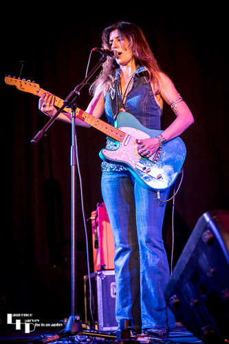 Susan Santos on guitar & vocals