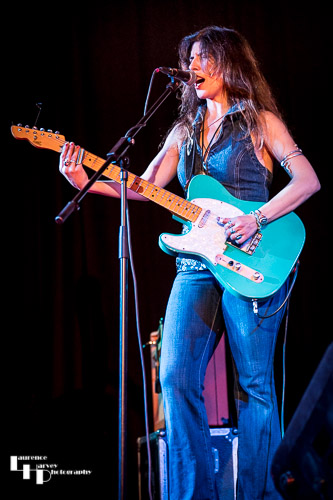 Susan Santos on guitar & vocals