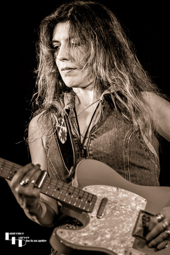 Susan Santos on guitar & vocals