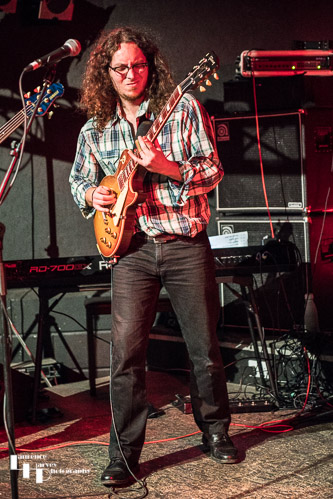 Sam on guitar & vocals