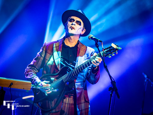 Adrian Stout on guitar & vocals