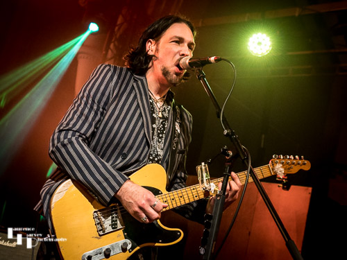 Aaron Bond on guitar & vocals