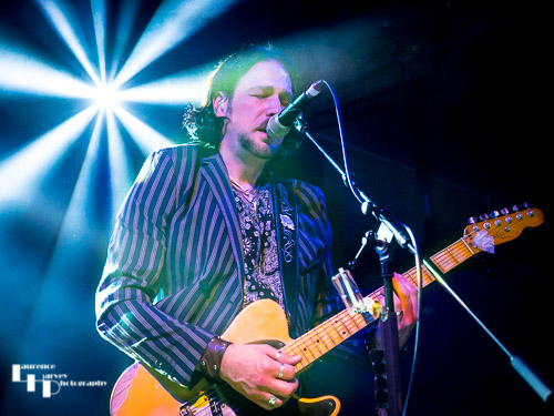 Aaron Bond on guitar & vocals