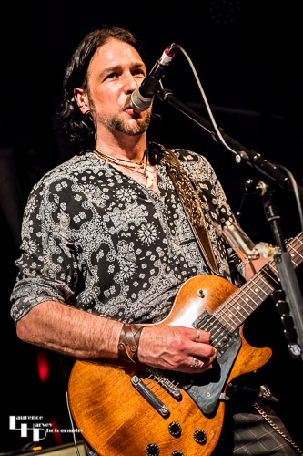 Aaron Bond on guitar & vocals