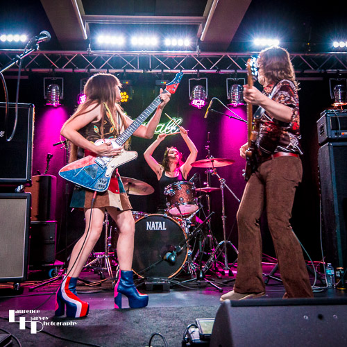 Arielle & her band on stage at Marshall Studios