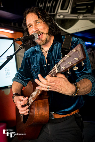Aaron Bond on guitar & vocals at the pre-show Meet & Greet
