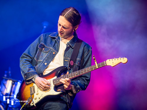 Ashley Sherlock on guitar & vocals