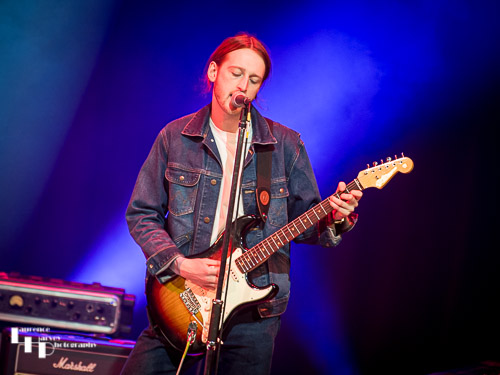 Ashley Sherlock on guitar & vocals