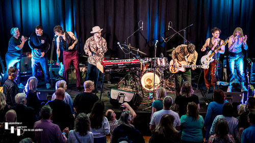 The Cinelli Brothers on stage at The John Peel Centre, joined by members of the audience