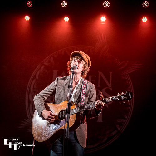 Greene on vocals & guitar