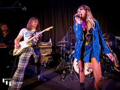 Megan Kane on vocals, Will Tipton on guitar