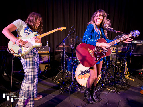Megan Kane on vocals & guitar, Will Tipton on guitar