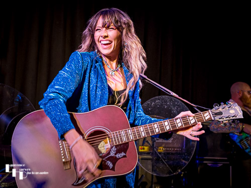 Megan Kane on vocals & guitar