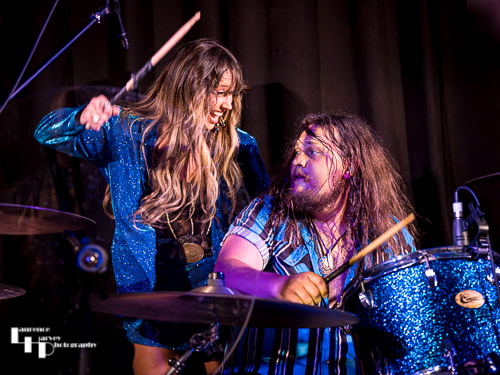 Megan Kane on vocals, Dylan Turner on drums