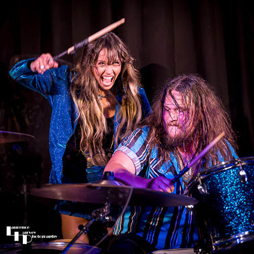Megan Kane on vocals, Dylan Turner on drums