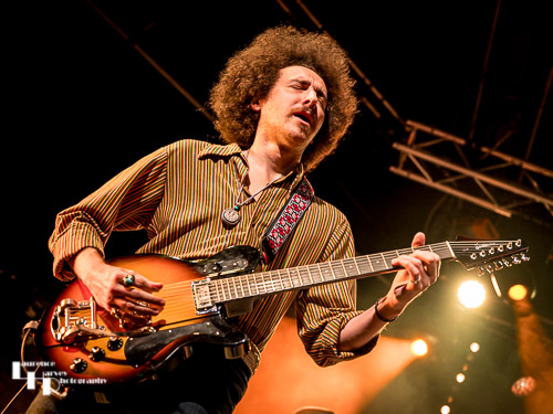 Henry James (Schneekluth) on backing vocals & guitar
