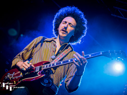 Henry James (Schneekluth) on backing vocals & guitar